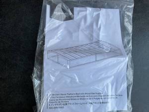 lot 137 image: Amazon Basics 6 inch Black Metal Twin Size Platform Bed Frame with Wood Slat Support
