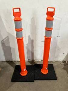 lot 56 image: Cortina Safety Products Set of 2 Orange EZ Grab Delineator 51 inch Post with 10 lbs Black Base