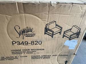 lot 6 image: Signature Design by Ashley Fynnegan Set of Two Lounge Chairs with Nuvella Cushions
