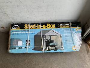 lot 34 image: ShelterLogic 6 x 6 ft. All Season Steel Metal Frame Peak Roof Outdoor Storage Shed with Waterproof Cover and Heavy Duty Reusable Auger Anchors