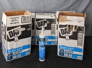 lot 85 image: Lot of 54 DAP Waterproof Clear Window, Door & Siding Silicone