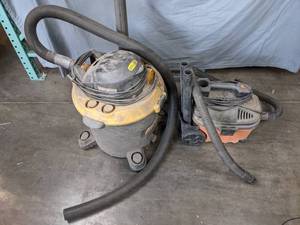lot 107 image: Rock River 16 Gal. 6.5 HP Shop Vac and Ridgid 4 Gal. Portable WetDry Vacuum