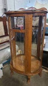 Mirrored and lit glass curio cabinet