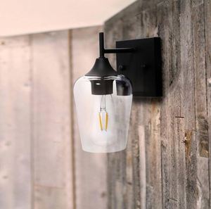 lot 12 image: Light Matt Black Wall Sconce with Clear Glass Shade