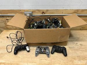 lot 104 image: Lot of Salvage Store Returns- Video Game Controllers and Related Items