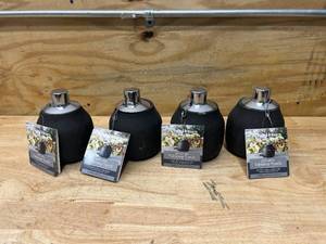 lot 46 image: BETTER HOMES & GARDENS Lot of 4- Tabletop Torches