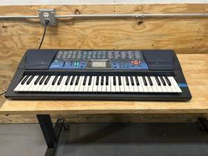 lot 53 image: CASIO 61 Key Electronic Keyboard