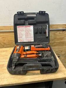 lot 65 image: RAMSHOT Nail Gun with Batteries and Charger in Case