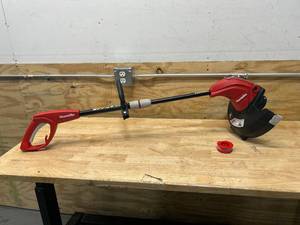 lot 70 image: HOMELITE 13 in. 4 Amp Straight Electric String Trimmer