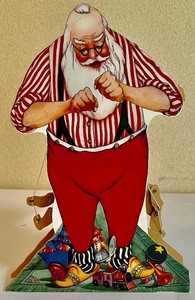 lot 34 image: Fun Decorative Pressed Board Musical Santa with Puppets