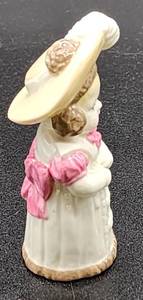 lot 253 image: Royal Worcester Feathered Hat  Candle Snuffer Figure