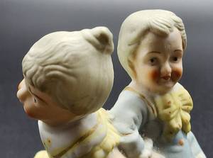 lot 165 image: Pair of Antique Chamber Pot Porcelain Figurines