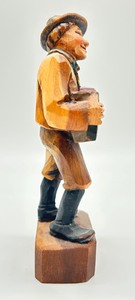 lot 300 image: Vintage Hand Carved Accordion Player Figurine