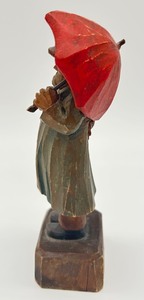 lot 297 image: Hand Carved Wooden Man with Umbrella Figurine - ANRI