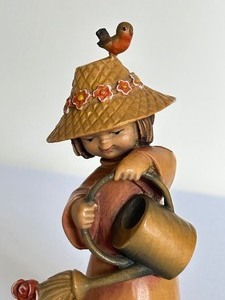 lot 17 image: Vintage Anri Hand Carved Girl with Watering Can
