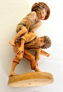 lot 29 image: Vintage Anri Hand Carved Wood Figurine Two Boys Leaping
