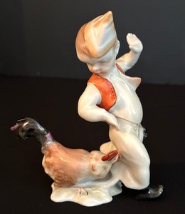 lot 50 image: Vintage Hand Painted Herend Boy with Chicken Figurine