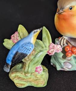 lot 365 image: Royal Doulton and Worcester Porcelain Bird Figurines