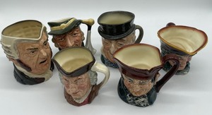 lot 128 image: Large Lot of Medium Vintage Royal Doulton Toby Character Jugs