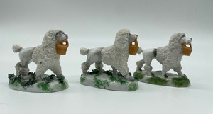 lot 101 image: Gold Anchor Mark Staffordshire Porcelain Poodle with Birds and German Poodle with Basket Figurines