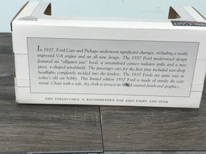 lot 10 image: 1937 FORD PICKUP DIECAST MODEL  SPECCAST LIMITED EDITION 1937 FORD PICKUP TRUCK COIN BANK