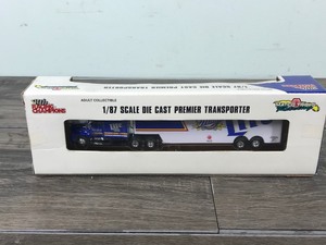 lot 11 image: 1997 Racing Champions Matco Tools Penske Racing Miller Lite Transporter 187 scale die cast
