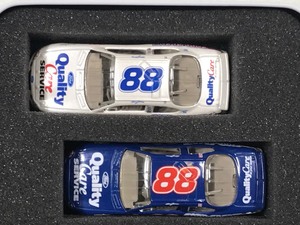 lot 20 image: 1998 JG Motor Sports 1999 Ford Taurus Dale Jarrett #88 Quality Care Service  Susan G. Komen Foundation 2 car set 164 scale die cast stock cars