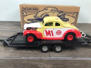 lot 26 image: 1996 ERTL Collectibles 1940 Ford Coupe wtrailer 125 scale die cast coin bank