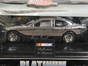 lot 62 image: 1999 Nascar Racing Champions Platinum Plated Precious Metal Series Johnny Benson #26  Cheerios 124 scale die cast stock car
