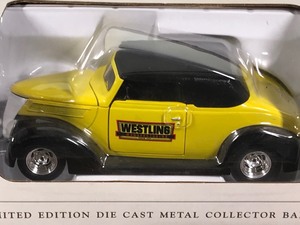 lot 69 image: Spec Cast 1937 Ford 125 scale die cast coin bank