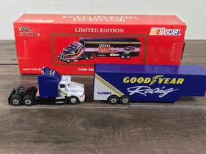 lot 80 image: 1993 Nascar Racing Champions Good Year Racing Transporter 164 scale die cast coin bank