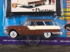 lot 106 image: 1997 Road Champs 1955 Pontiac Safari Station Wagon 143 scale die cast