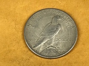 lot 122 image: 1925 Peace Silver Dollar
