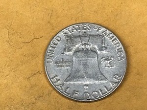 lot 124 image: 1962 Franklin Silver Half Dollar