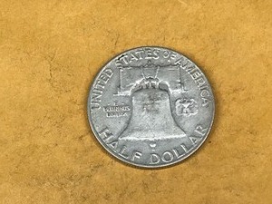 lot 128 image: 1957 Franklin Silver Half Dollar