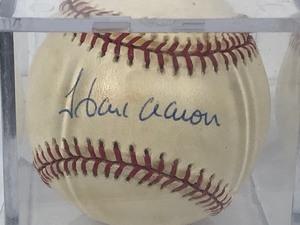 lot 170 image: Hank Aaron signed baseball with certificate of authenticity