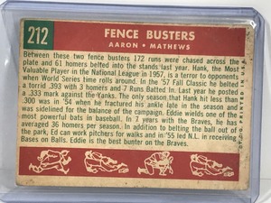 lot 400 image: 1959 Topps Baseball Card Hank Aaron & Eddie Mathews Fence Busters #212
