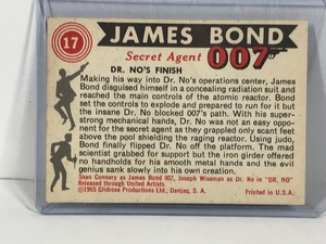 lot 414 image: 1965 Glidrose Productions James Bond Secret Agent 007 - Dr. NOs Finish #17 Collector Card