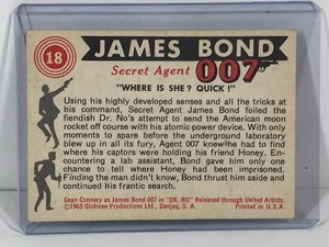 lot 415 image: 1965 Glidrose Productions James Bond Secret Agent 007 - Where is she Quick #18 Collectors Card