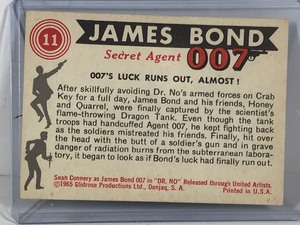 lot 416 image: 1965 Glidrose Productions James Bond Secret Agent 007 - 007s Luck runs out, Almost #11 Collector Card
