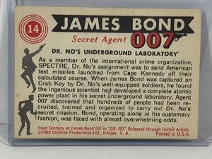 lot 419 image: 1965 Glidrose Productions James Bond Secret Agent 007 - Dr. Nos underground laboratory #14 collectors card
