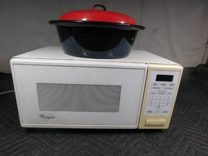 lot 201 image: Microwave and metal dutch oven