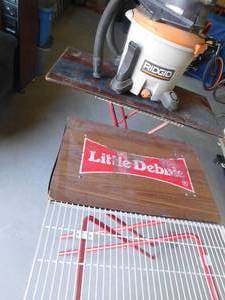 lot 205 image: Rigid shop vacuum and 3 Little Debbie display tables
