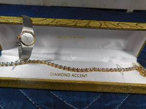lot 225 image: Citizen watch and diamond accent 18K gold plated bracelet