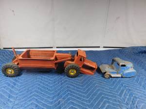 lot 255 image: vintage metal tractor with grain hauler and old metal semi