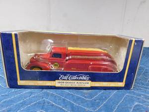 lot 299 image: Die cast metal 1939 New holland Lubricants Dodge airflow Ertl bank