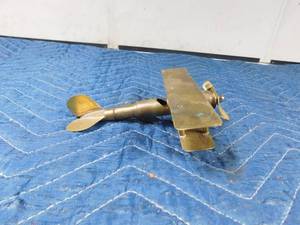 lot 308 image: Brass airplane made out of a bullet