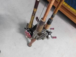 lot 319 image: 3 fishing rods and reels