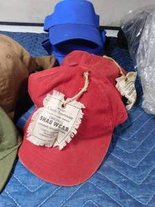 lot 505 image: box of caps and visors
