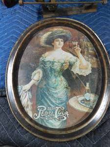 lot 7 image: vintage oil can, Pepsi tray, irons, Ertl trailer and more